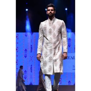 Cream Ikat Booti Print Dupion Silk Embroidered Sherwani Worn with Off White Cotton Silk Churidar